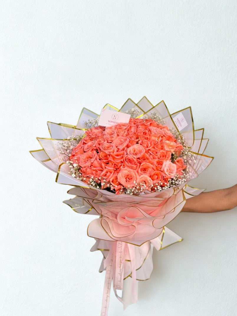 un joli bouquet de 100 roses roses