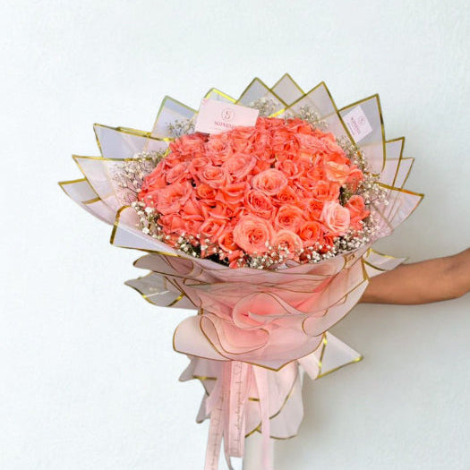 un joli bouquet de 100 roses roses