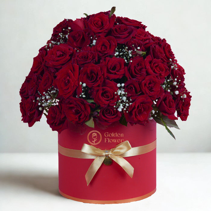 a modern floral box of red roses